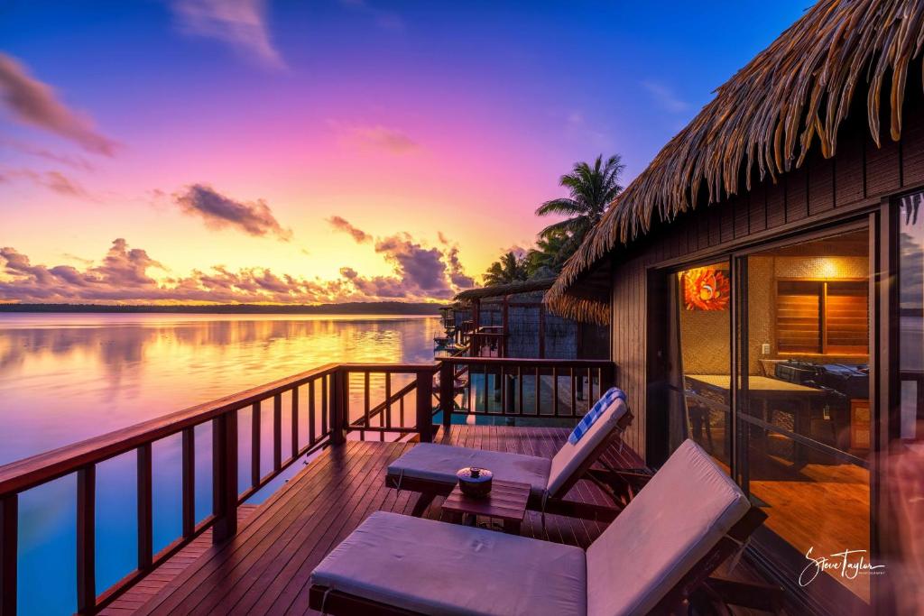 Aitutaki Lagoon Private Island Resort - Sunset from the Water Bungalows