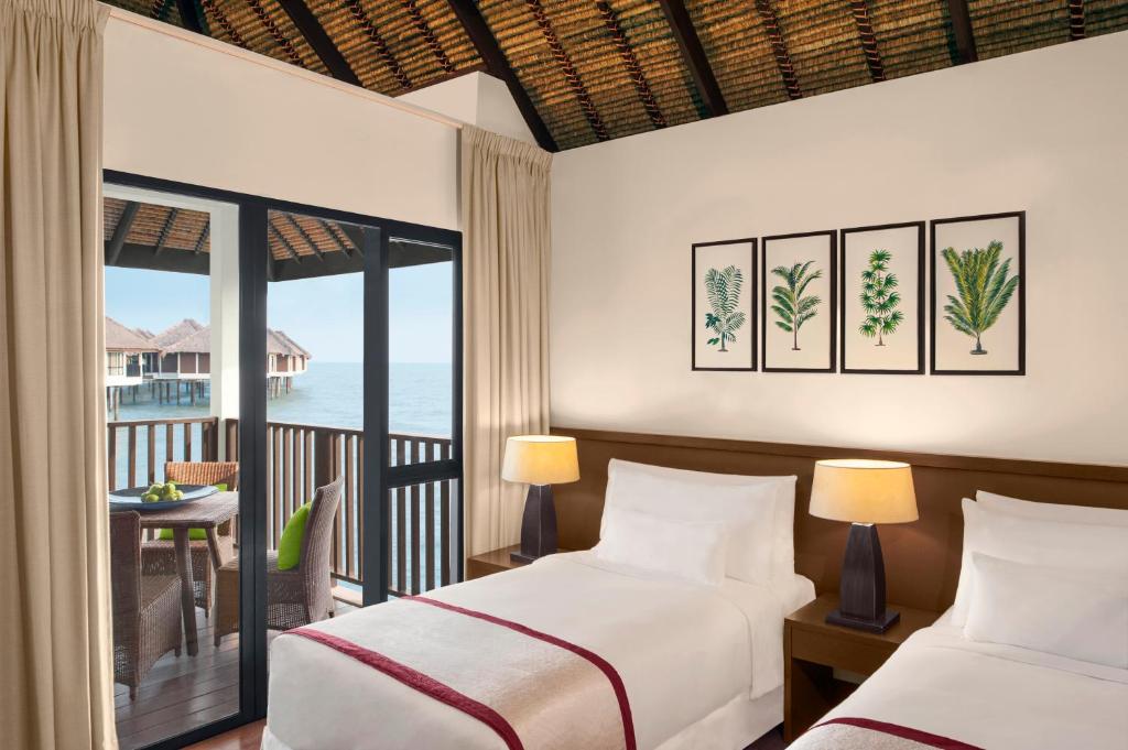 Avani Sepang Goldcoast Resort Water Villa Interior
