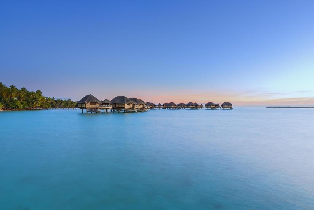 Le Taha'a by Pearl Resorts - Water Bungalows Side View