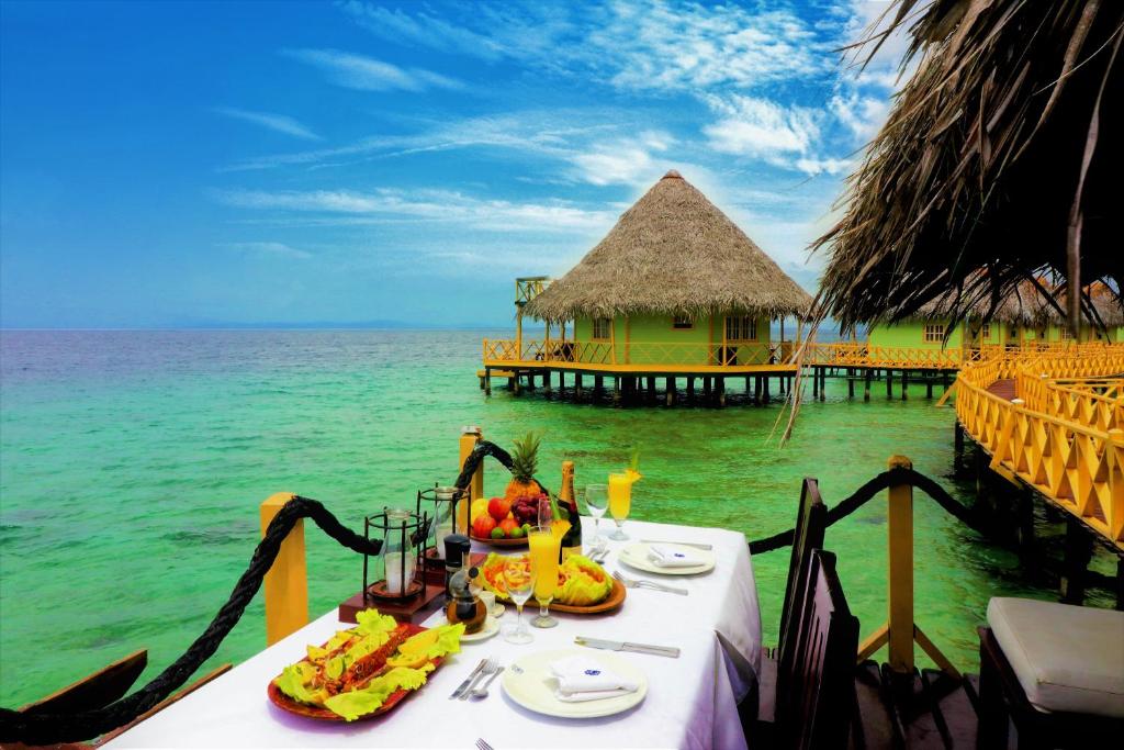 Punta Caracol Acqua Lodge - Water Bungalows In-room Dining