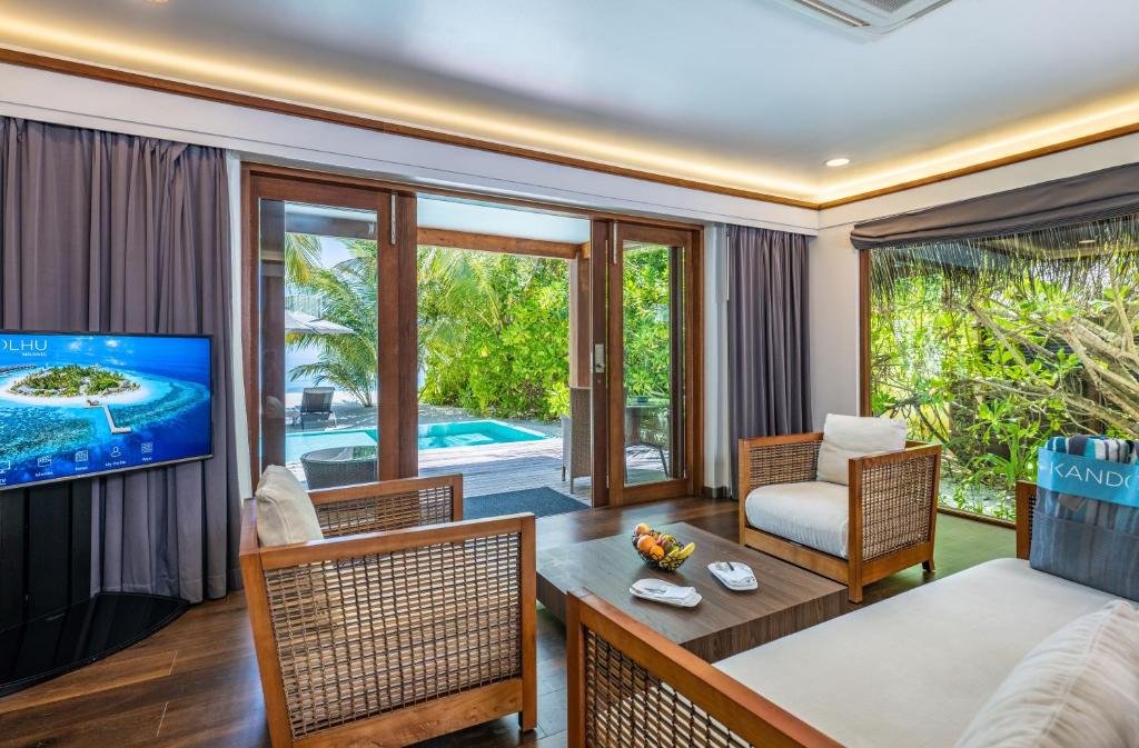 Kandolhu Maldives - Beach Bungalows View from Bed