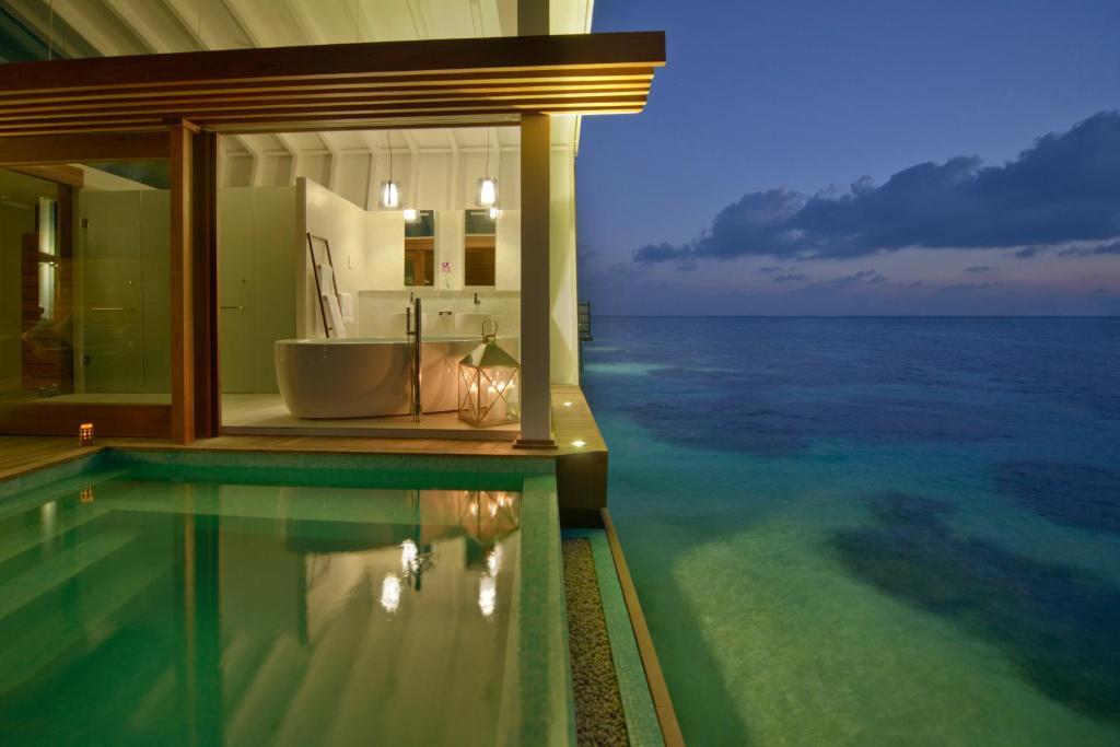 Kandolhu Maldives - Water bungalows Sundeck View in Evenings
