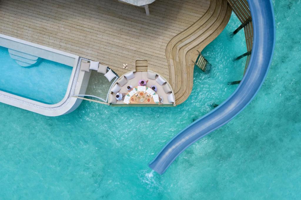 Soneva Fushi - Water Bungalows with Pool, Hammock and Slide