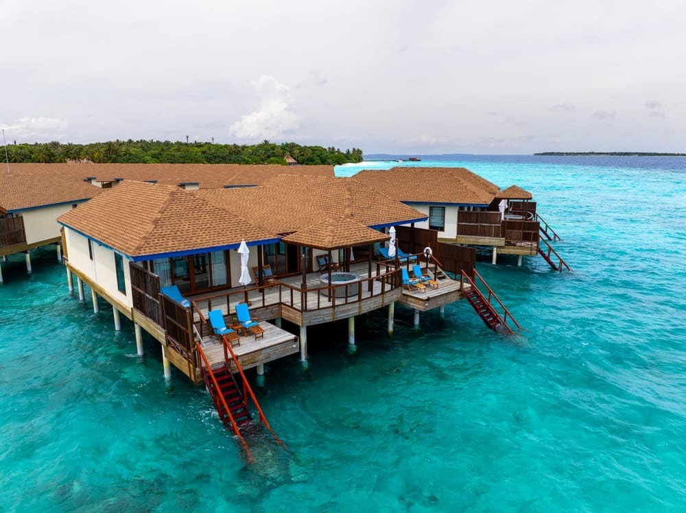 Maldives Water at Reethi Faru Maldives offers natural light, warm décor, and wooden ceilings, all gently touched by the fresh island breeze
