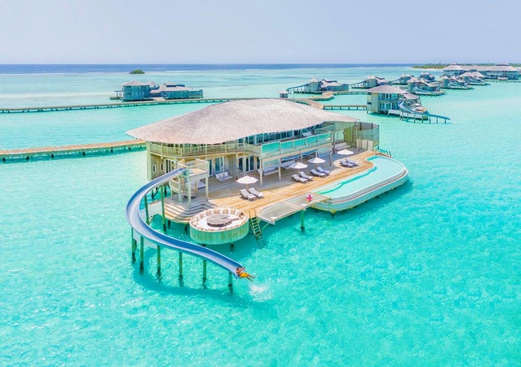 The Definitive Guide to the Best Luxury Overwater Villas with Water Slides